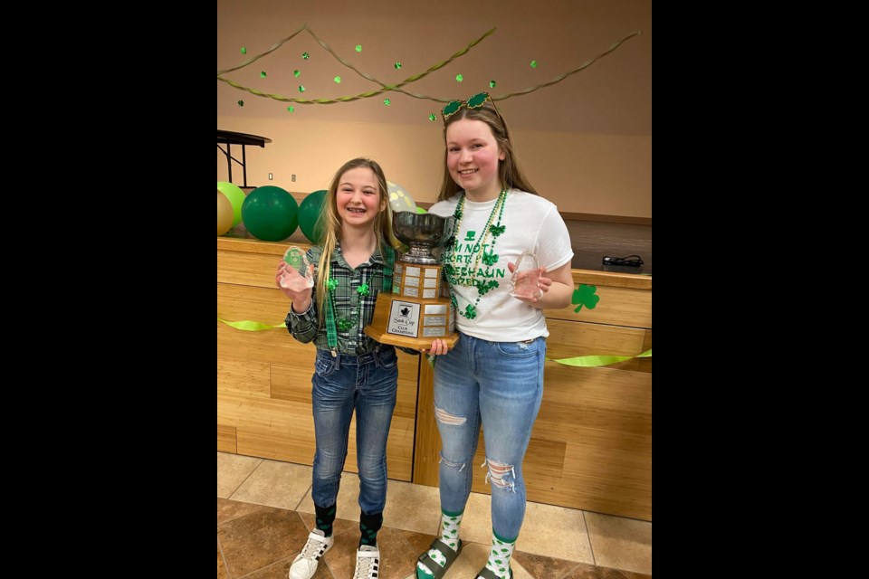 Chenae Bowker and Alexis Elder, Unity skiers, show off their season end hardware.