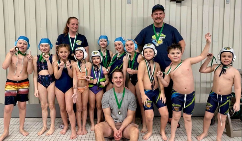 Mini U9 Sharks: Tripp Davies, Scarlett Miiller, Sophie Kawecki, Sadie Pennington, Matilda Nichols, Hayden Friess, Rose Chabot, Lexi Olson, Sawyer Klotz, Leo Cozman and Patrick Johnson. Coaches: Amanda Johnson, Matthew Olson and Paul Chabot