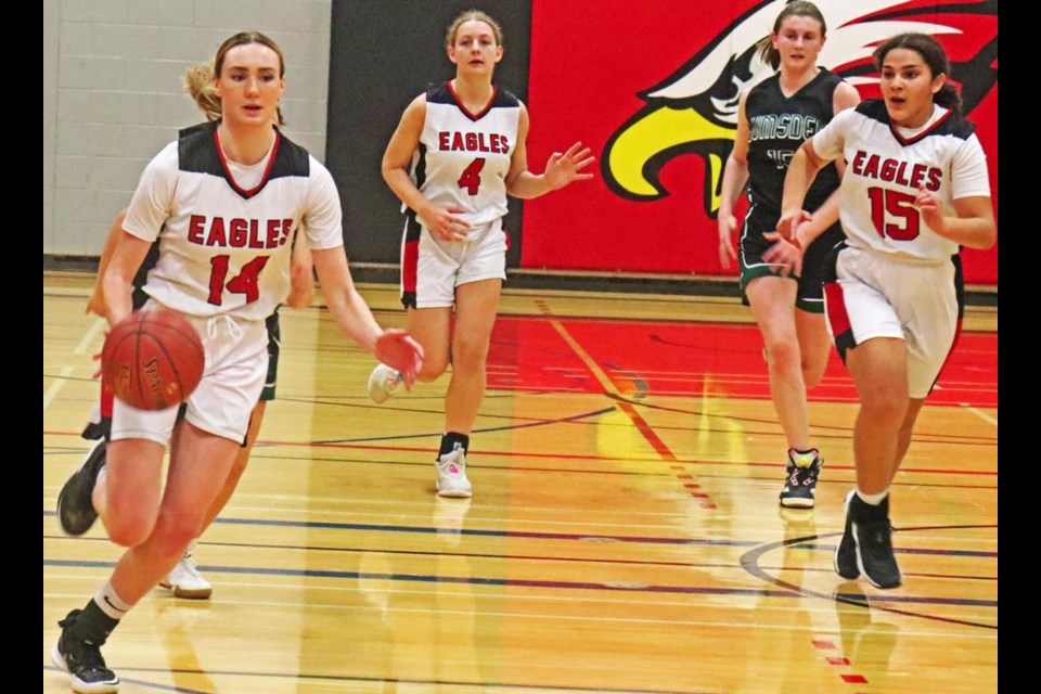 WCS Eagles player Aycen Schwindt brought the ball in a rush down the court, during Weyburn's game vs Lumsden on Friday.