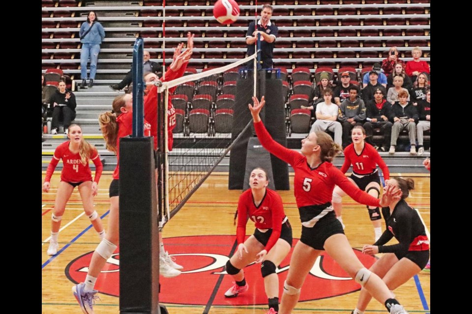 WCS Eagles player Zoe Kerr reached up to tip the ball over the net, during the senior girls first game at provincial vs Swift Current.