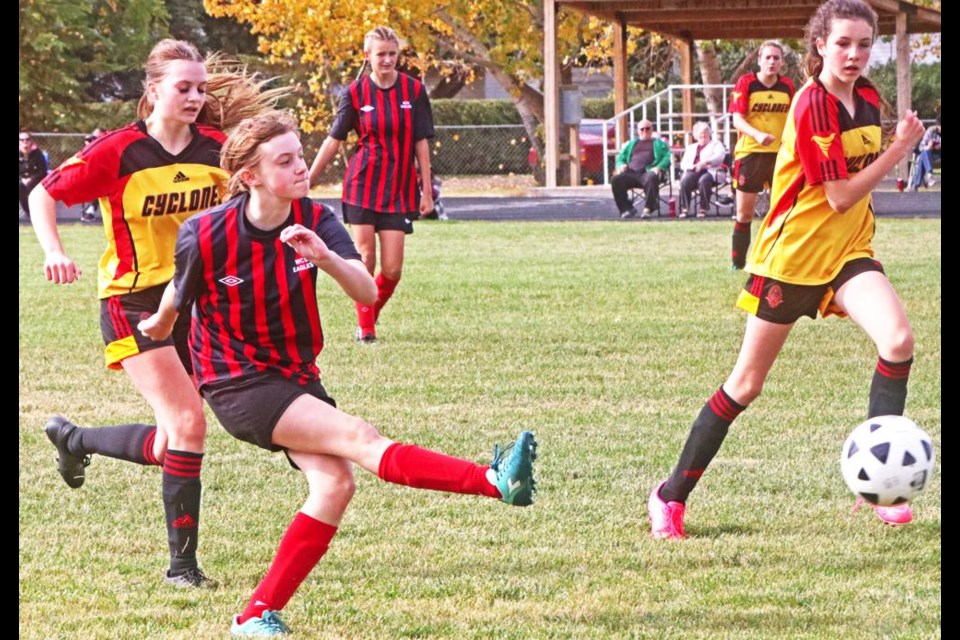 Weyburn Comp Eagles player Lilith Moffat gave a hard kick of the ball towards Moose Jaw's zone, during a soccer match in Weyburn last summer.