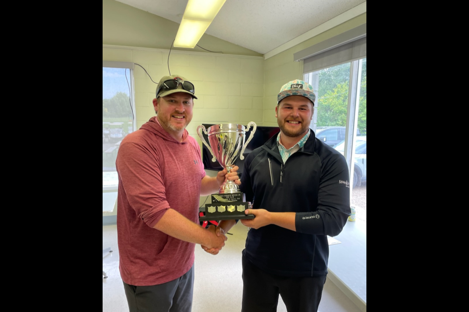 The Canora Men’s Open Golf Tournament was held on Aug. 26, with Zac Fedorak of Kamsack (right) winning the championship by shooting a two-under par score of 70. Presenting the championship trophy was Curtis Baillie, Canora Golf and Country Club executive member. Canora and area golfers have one more tournament to look forward to this season, the Canora Senior Cobras four-man Texas scramble on Sept. 23.