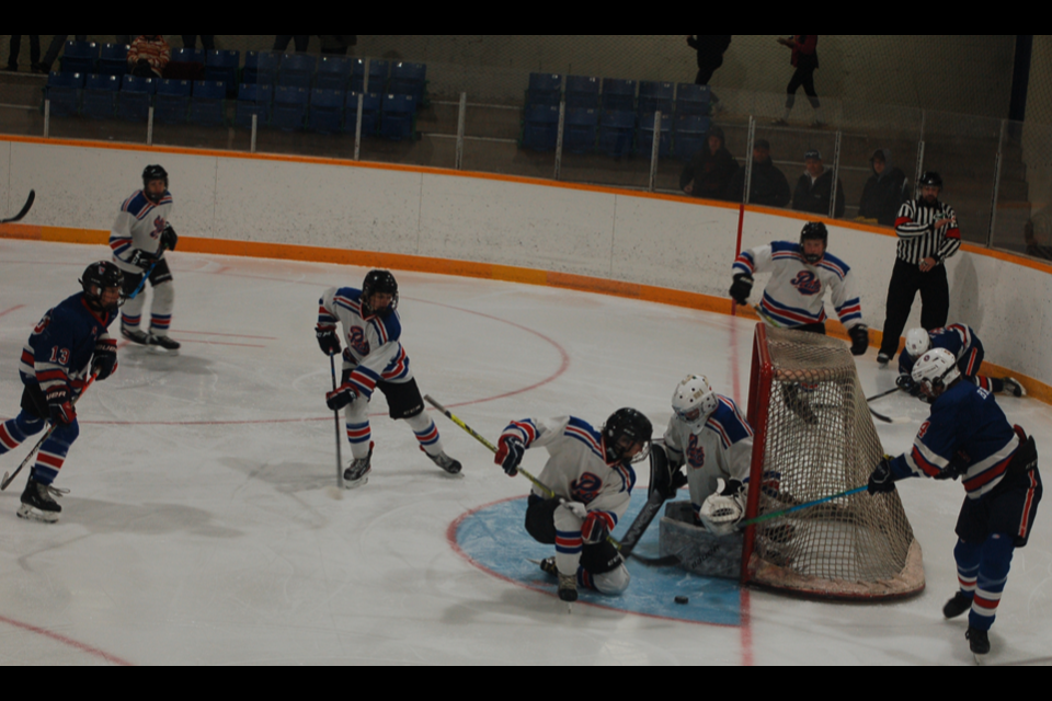 Goalie Skylar Ryczak has been instrumental in propelling the Preeceville Pats U18 hockey team to the top of the league with an undefeated record. Playing against Moosomin Rangers, from left, were: Bronson Heshka, Rhett Ludba and Hunter Lamb of Canora, Ryczak and Mason Babiuk.