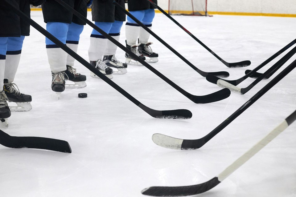 hockey-sticks-on-ice