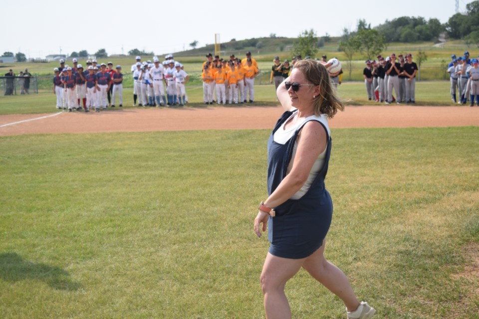 Jen Lozinsky performed this year's ceremonial opening pitch. 