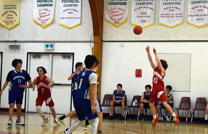 Shiloh Leson of the Cougars picked up the offense with a three-pointer in the second half.