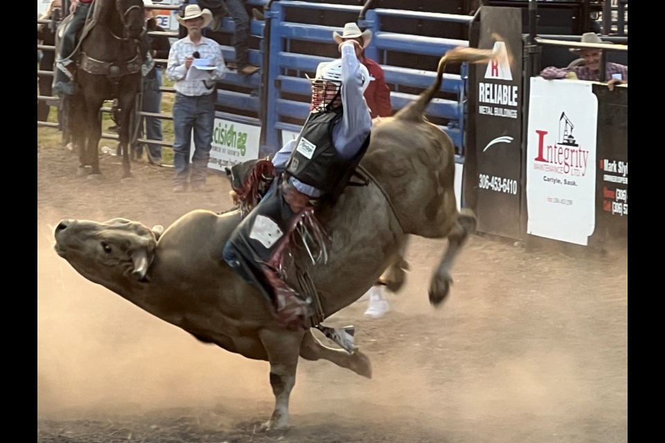 Stefan Tonita from Saskatoon gave it his all to remain on his bucking bull for eight seconds. 