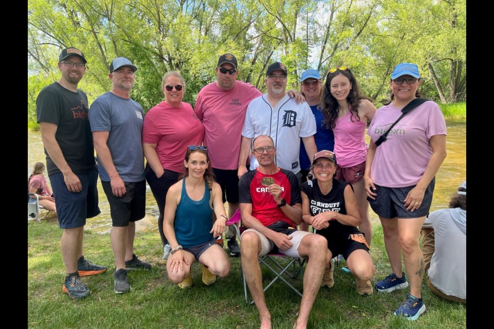 Pictured here are Marcel Macfarlane's crew and pacers. Front row, from left, Jenn Meredith, runner Marcel Macfarlane and his wife Dawn Pauwelyn. Back row, Warner Ignatiuk, Cory Meredith, Jamie and Neil Sorrestad, Brad and Eliza Belke, Leah Macfarlane and Tammy Ignatiuk.