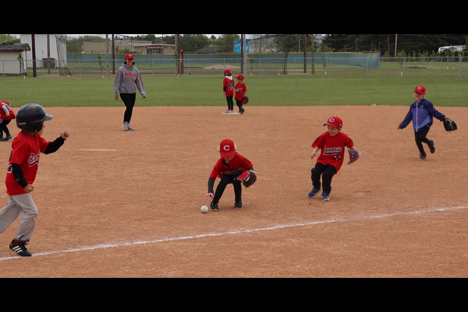 There was plenty of action with the baserunner sprinting to first and fielders chasing down the ball in the Junior Rally Cap game. It was an all-Canora contest as Team 1 took on Team 2.