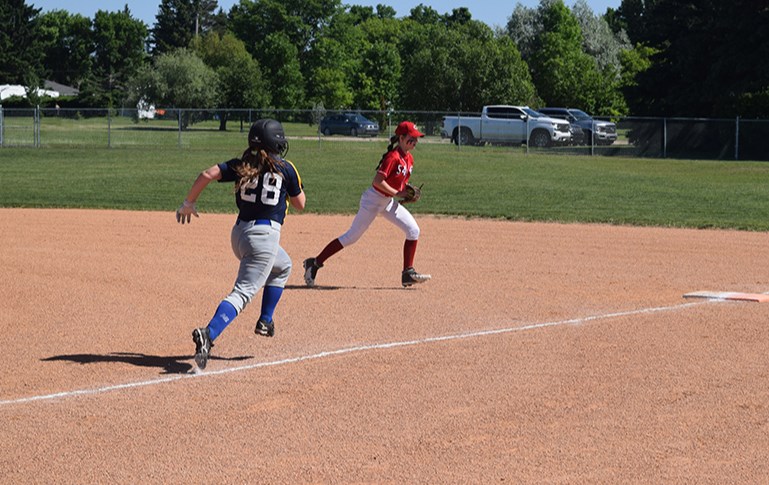 The race was on as Presley Vogel of the Canora Reds U15 Softball Team 1 fielded a batted ball and beat the Esterhazy baserunner to first base to record the out during Canora Minor Ball Day on June 10. 