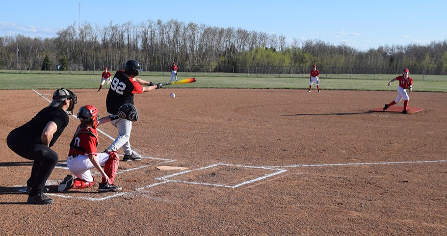 Under beautiful sunny skies, the first game of the new Canora baseball season took place on May 8 with the U15 Canora Reds hosting Keeseekoose. Reds pitcher Walker Wolkowski and catcher Lucas Thompson combined to fool the Keeseekoose hitter on this pitch.  The final score was 21-12 for the Reds, reported Manager Amanda Zbitniff. “The game started out shaky for Canora, but they were able to pull it together after the second inning.”  