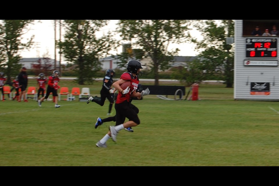 Unity Jr. Warrior, Theo Wichman, was able to run the ball down the field to score the first touchdown of the home-opener game against the Plenty Jr. Wildcats Sept. 17.