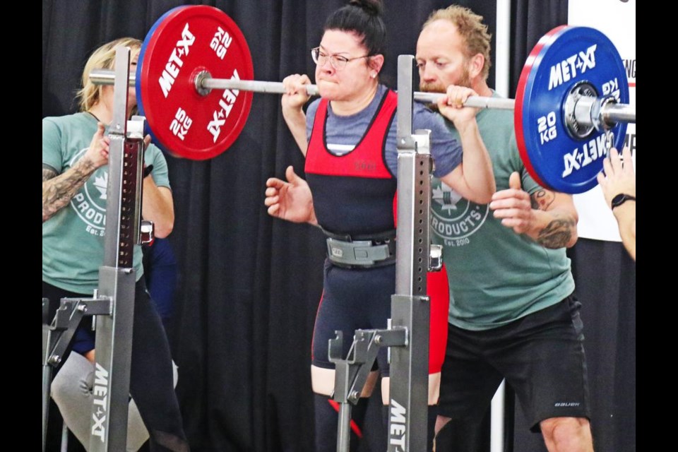 Okotoks powerlifter makes world record lift 