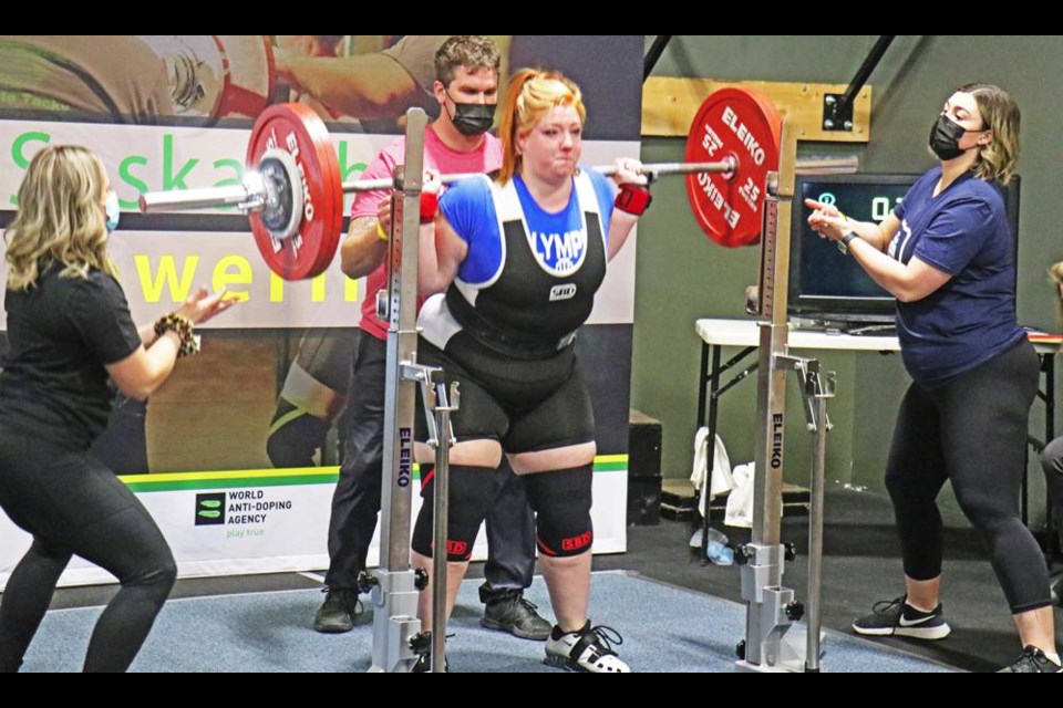 Okotoks powerlifter makes world record lift 