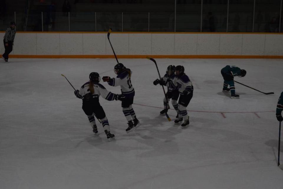 Jessee Kopelchuk of Canora (left) scored the game winning goal late in the third period against the Balcarres Barracudas on March 12 and celebrated with her Prairie Ice teammates. The Ice went on to win the game and the series 2 to 0.

