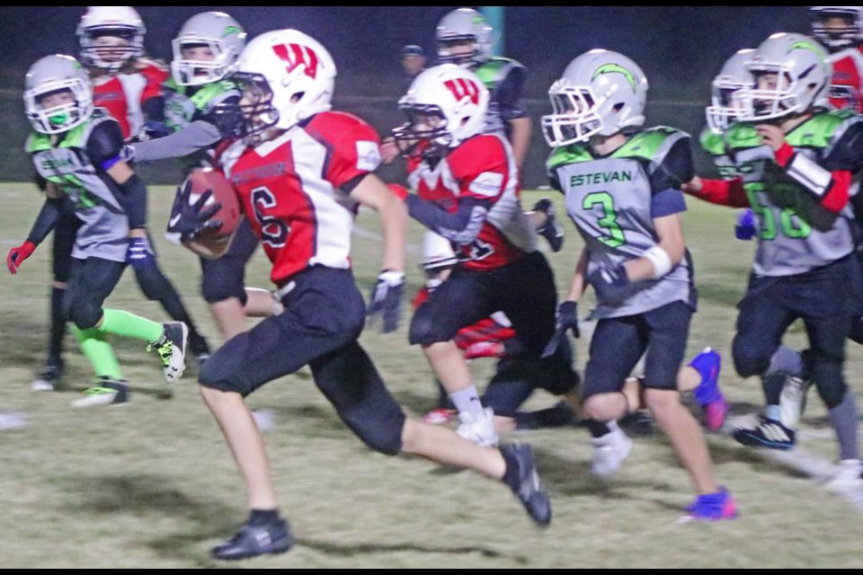 Weyburn Ravens running back Caleb Duhamel ran for a long touchdown in the game vs the Estevan Chargers on Friday.