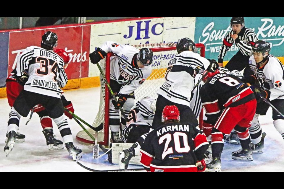 There was a big traffic jam in the crease of the Yorkton net as the Weyburn Red Wings pressed for a goal on this play in the second period.