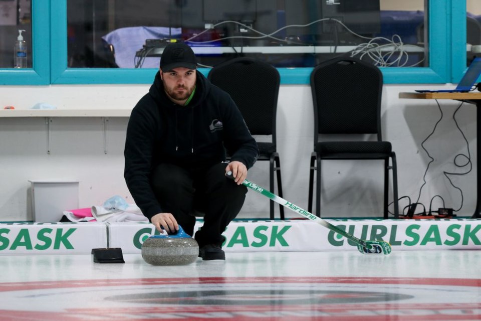 Brandon Zuravloff of Canora took a moment to focus on the task at hand before he delivered a rock during the U21 Saskatchewan Junior Provincial Curling Championship in Marvensville.