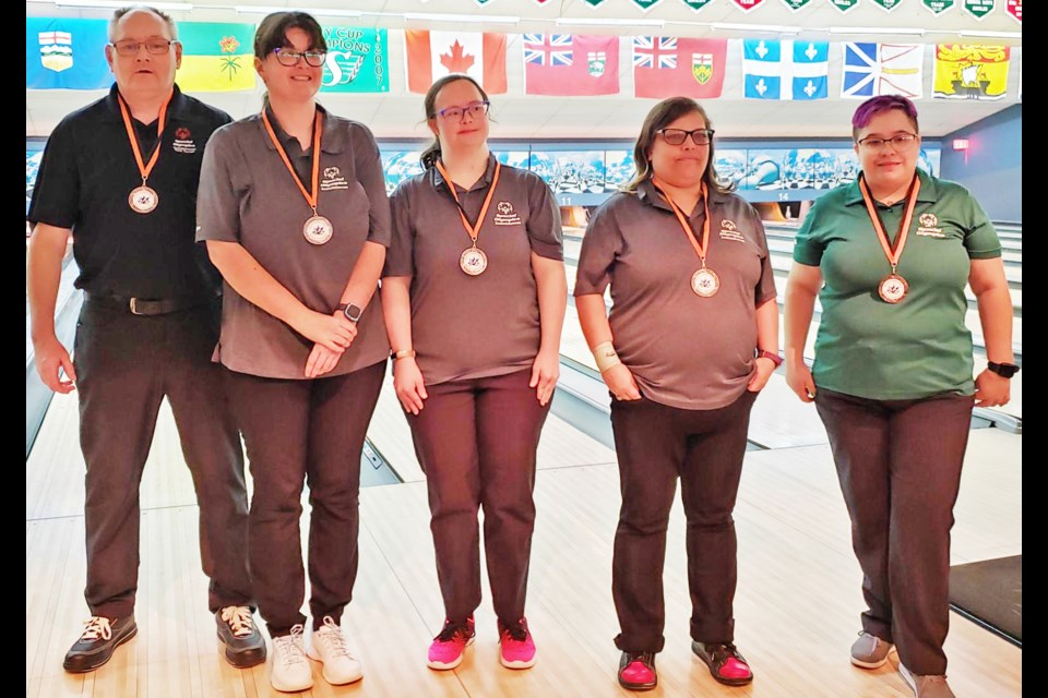 This team is made up of athletes from Swift Current, Humbolt and Weyburn and they just competed as a team at a Special Olympics Regina tournament this past weekend.  They earned a Bronze Medal in the B division. Pictured are Harold (Swift Current) Jocelyn, Maria, Melissa (all from Humboldt) and Robin Stelter, Weyburn.