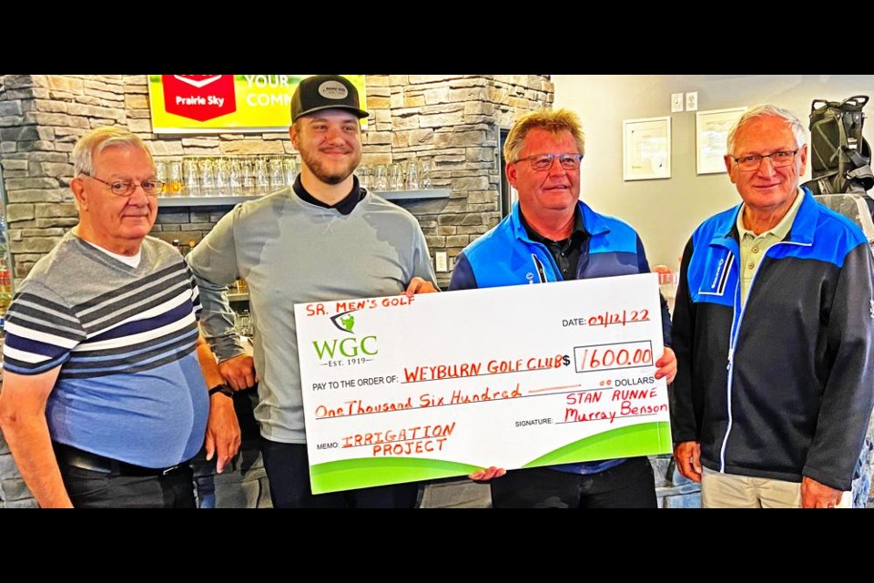 The Weyburn Senior Men’s Golf Club presented the proceeds of their 50-50 draw held throughout the season to the Weyburn Golf Club in support of their irrigation project. From left are Frank Kaip, golf club manager Chad Brock, Murray Benson, chair of the fundraiser, and Mickey Woodard.