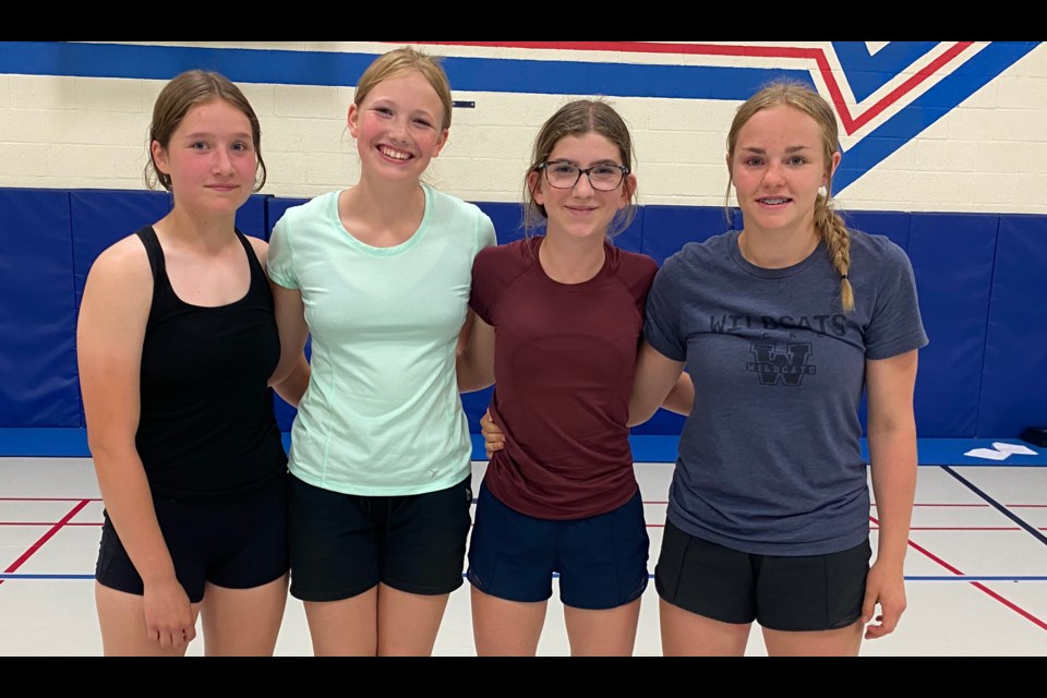 Grade 8 girls: Reyna Reiman (third), Kaelyn Snape (second), Sheridyn Scott, and Charlize Hillmer (first).