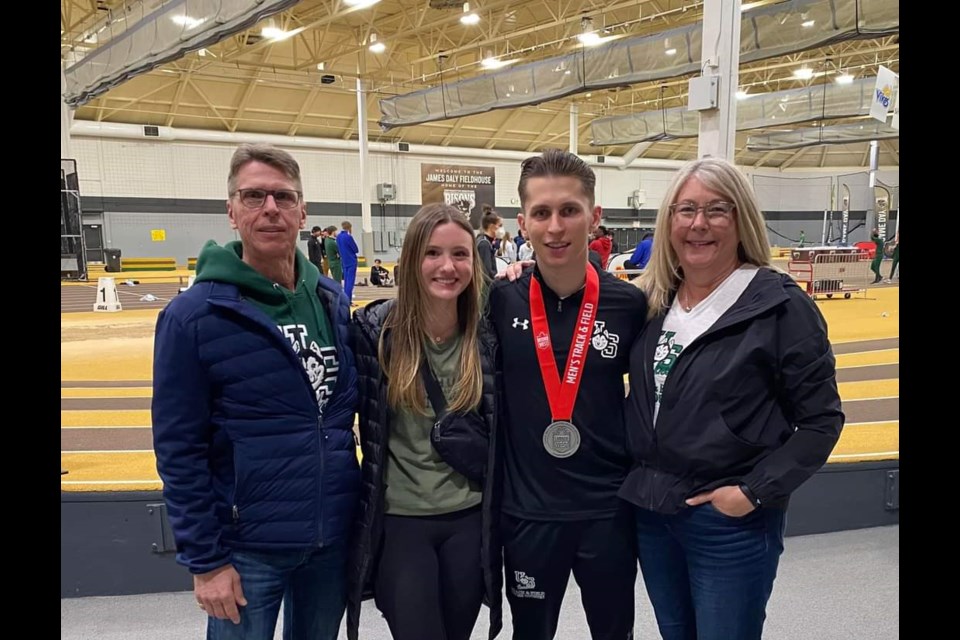 Treyton Pernitsky's parents, Sheldon and Syndee Pernitsky,  and girlfriend Sydney Dutchak, stand with him after his silver medal win at Can-West championships held in Winnipeg March 18-19, earning him a spot at the national competition March 25-26.