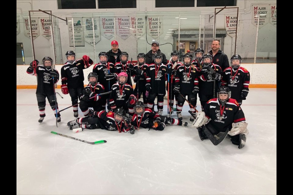 The U11 Canora Cobras attended the Kamsack Flyers tournament on Saturday, February 5. Teams from Regina, Roblin, Kamsack and Canora were present. The Cobras celebrated winning the A side of the tournament, making them tournament Champions. According to reports from Kamsack, “The tournament was a lot of fun with a skills competition in which all players and teams participated.” Cobras team members, from left, were: (back row) head coach Jeff Sznerch, assistant coaches Kurtis Shukin and Colin Kitchen; (third row) Cameron Sznerch, Zarin Godhe, Reid Kitchen, Kasen Heshka, Kenzee Kopelchuk, Angel Sliva, Courtlyn Heshka and Ashton Strelioff; (second row) Caden Doogan, Chloe Doogan, Priah Wolkowski, Yuri Olynyk and Wade Vangen; and (front) Declan Unick, Karter Shukin and Mason Reine. / Canora Minor Hockey