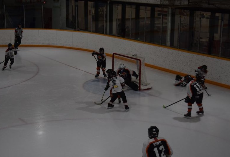 No. 8 Zarin Godhe of the U11 Canora Cobras (white jerseys) was stopped on this shot, but later scored the overtime series winning goal against the Yorkton FFUN Motorsports Terriers on March 11 in Canora.