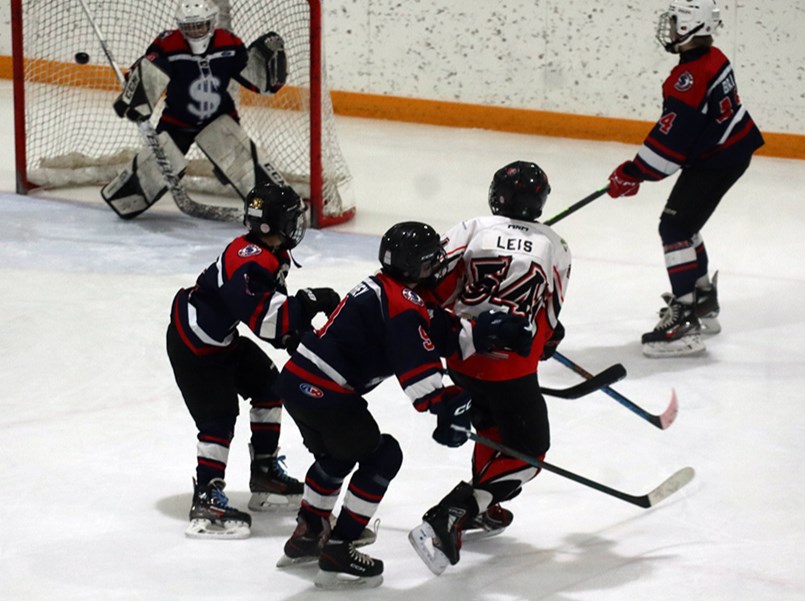 In spite of heavy checking pressure, Bryden Leis of Kamsack found the net for U13 Flyers on the stick side with this pinpoint shot against the Melville Millionaires on Jan. 18. 