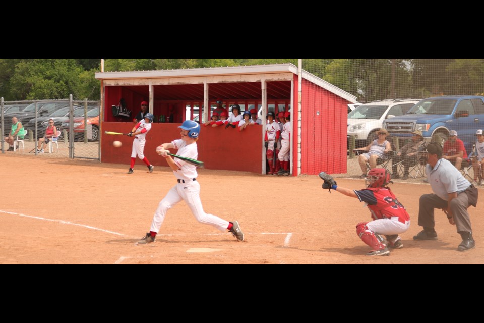 A Yorkton Cardinal swings in action Saturday.