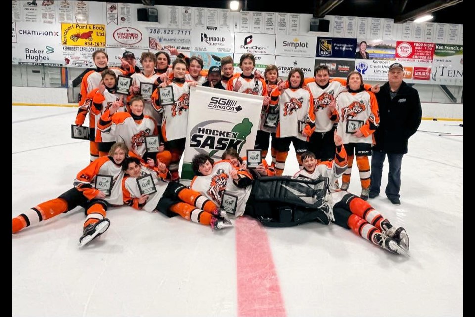 KDL U15 Tigers celebrate the provincial D championship won on home ice, March 25.