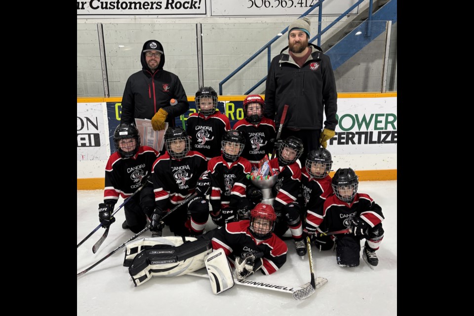 Canora team black, coached by Kelly McTavish and Parker Rice (assistant) and managed by Jodie Kowalyshyn, went through the round robin portion of the tournament with three wins in three games. In the A Final, Canora lost a tight 7-6 battle to Moosomin. From left, were: (back row) - Parker Rice, Noah Galli, Colt Edison, and Kelly McTavish; (middle) Mae McTavish, Jolene Wegner, Cohen Dutchak, Lowell Rice, Owen Kozmaniuk and Lochlan Rice; and (front) Atlin Godhe, goalie.