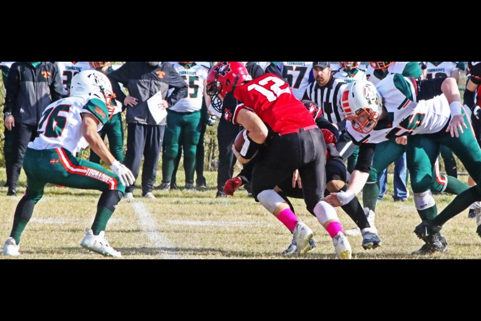 WCS Eagles QB Conner Kerr carried the ball to a first down, on this play vs Moose Jaw Tornados on Saturday.