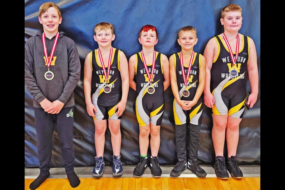 Members of the Weyburn Wrestling Club came home with medals from a wrestling tournament in Winnipeg over the weekend. From left are Ephraim Henning, gold; Jep Furgason, silver; Conner Pocha, gold; Owen Arthur, silver; and Donovan Lanz, silver. Missing from photo is Brysen Richaud, gold.