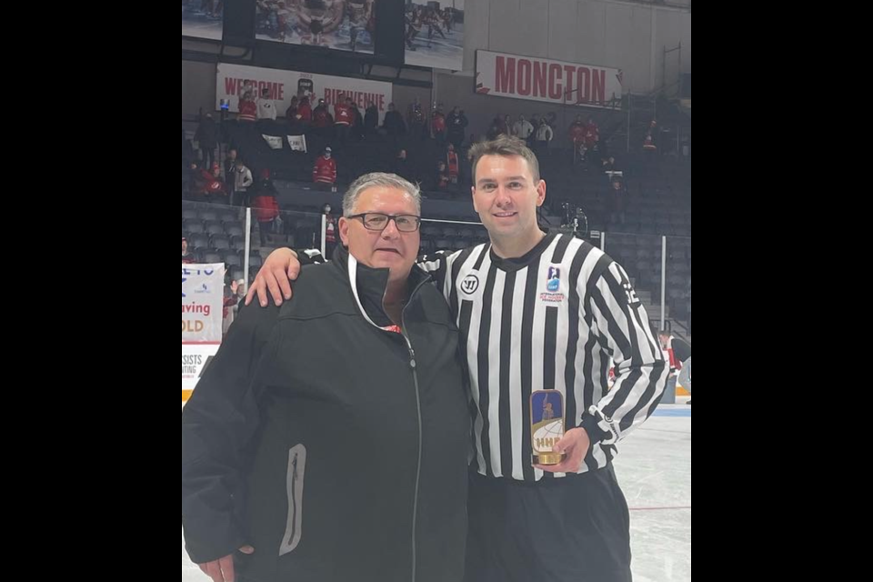 Tarrington Wyonzek, who has ties to Canora, has been selected as a linesman for the upcoming IIHF World Hockey Championship, set to begin Thursday, May 10 in Czechia. Wyonzek is seen here with his father Pat at a previous World Junior Hockey Championship. 