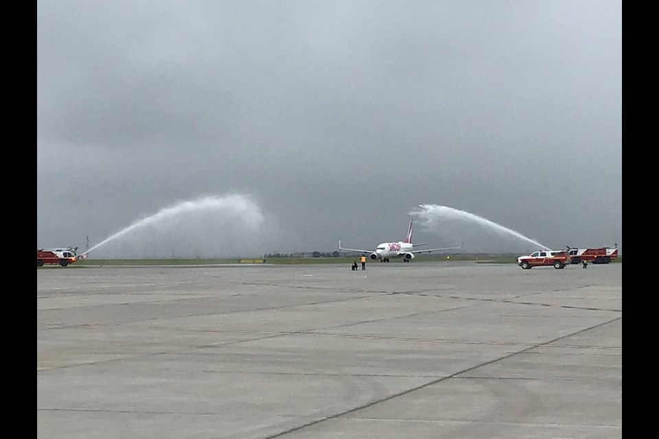 Regina International Airport provides a full water cannon salute to the first Swoop flight to land in Regina.