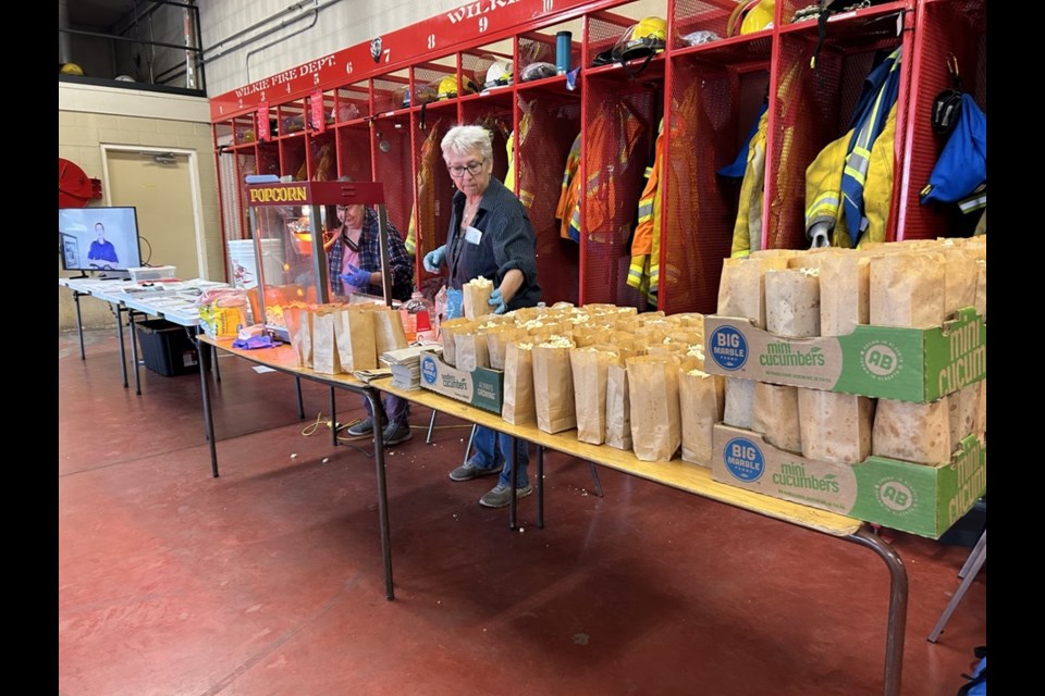 Members of the Wilkie and District Museum filled bags of popcorn at the fire station, supporting the department during Fire Prevention Week.