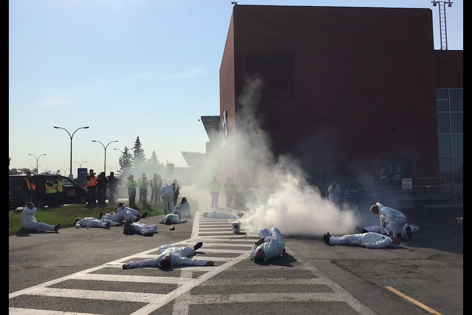 The scene outside the YQR terminal as a drone attack simulation is under way.