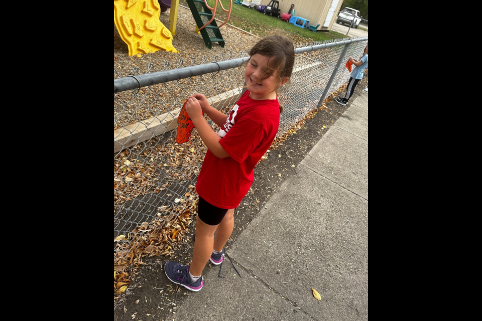 Mae McTavish was one of the students in the Grade 2/3 class at Canora Junior Elementary School who found their own voices to highlight the importance of Truth & Reconciliation on Sept. 30, said Alexandria Blatter, teacher.
“We hung orange t-shirts we made on our school fence to share with our community what truth and reconciliation means to us.” 
