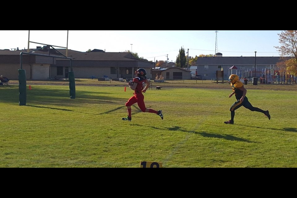 UCHS Warrior, Jaden Blanchette, scores a running touchdown against Biggar Sept. 21.