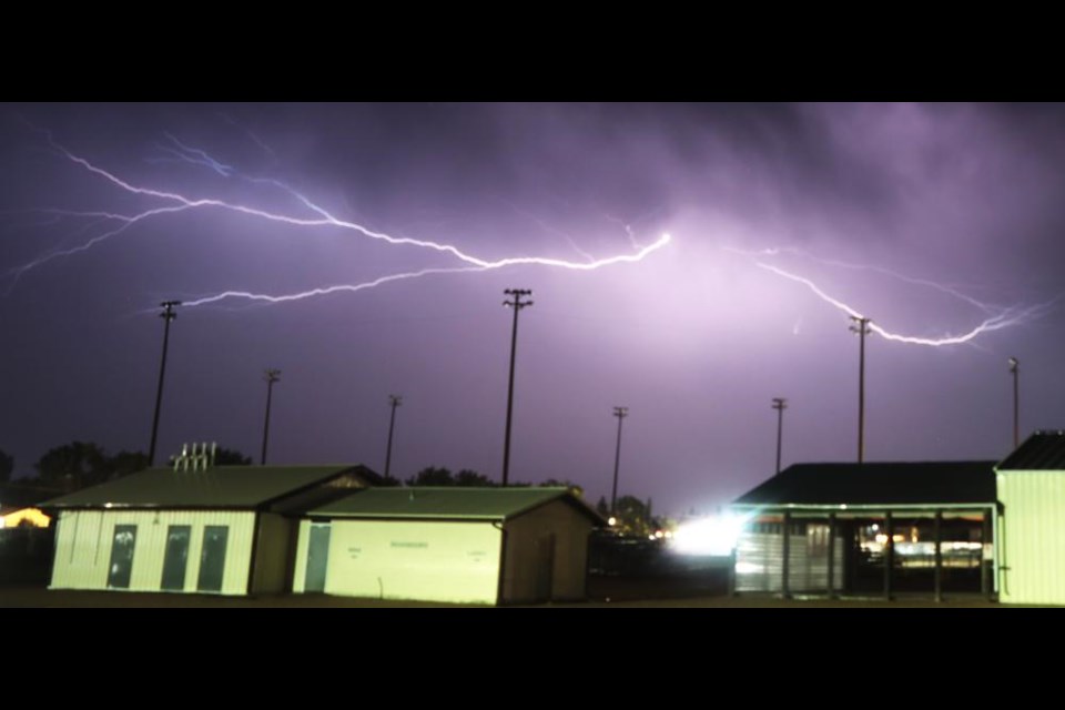 Lightning forked across the sky over Tom Laing Park on Thursday evening, as a thunderstorm brought heavy rain and strong winds as well.