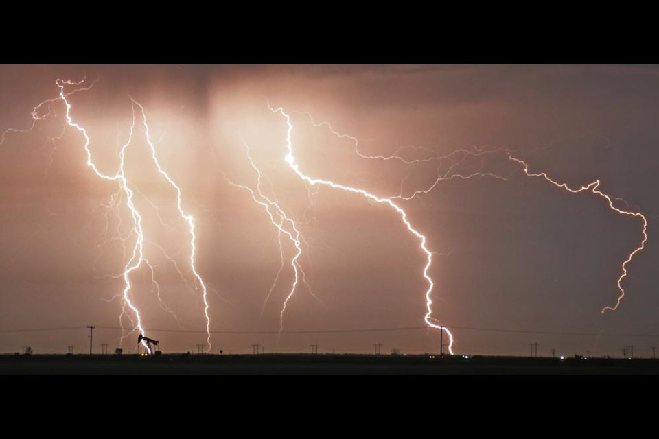 Multiple bolts of lightning flashed through the night sky from this thunderstorm as viewed from near Ralph on Friday evening.