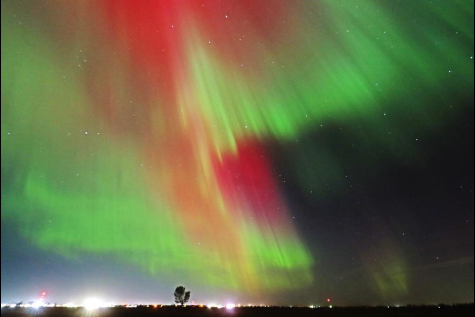 The reds and greens are indicative of oxygen in the upper atmosphere, with red being very high-altitude oxygen interacting with the solar wind particles.