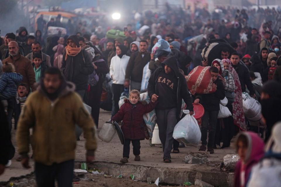 Displaced Palestinians return to their homes in the northern Gaza Strip, following Israel’s decision to allow thousands of them to go back for the first time since the early weeks of the 15-month war with Hamas in accordance with a fragile ceasefire, Monday, Jan. 27, 2025. (AP Photo/Jehad Alshrafi)