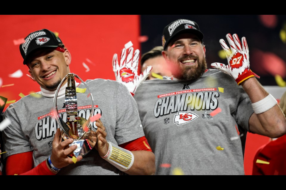 Kansas City Chiefs quarterback Patrick Mahomes and tight end Travis Kelce celebrate victory against the Buffalo Bills after the AFC Championship NFL football game, Sunday, Jan. 26, 2025, in Kansas City, Mo.(AP Photo/Reed Hoffmann)