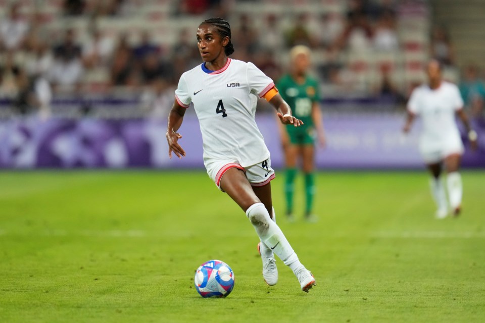 FILE - United States' Naomi Girma controls the ball during a women's group B match between the United States and Zambia at Nice Stadium at the 2024 Summer Olympics, Thursday, July 25, 2024, in Nice, France. (AP Photo/Julio Cortez, File)