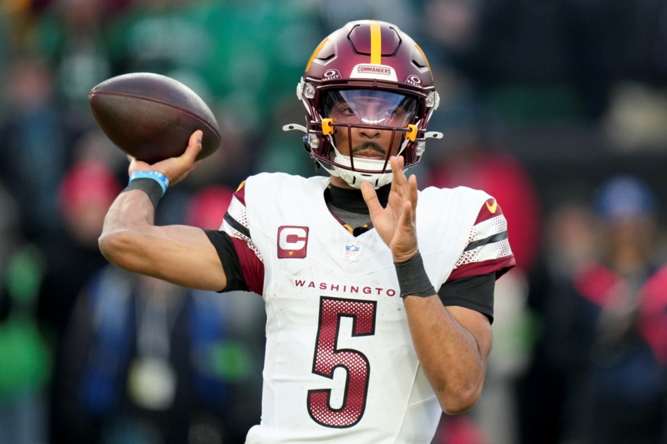 Washington Commanders quarterback Jayden Daniels passes against the Philadelphia Eagles during the first half of the NFC Championship NFL football game, Sunday, Jan. 26, 2025, in Philadelphia. (AP Photo/Seth Wenig)