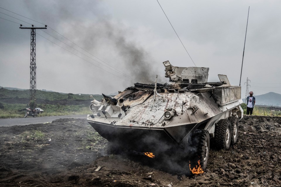 CAPTION CORRECTS YEAR A UN armoured personnel carrier burns during clashes with M23 rebels outside Goma, Democratic Republic of the Congo, Saturday, Jan. 25, 2025. (AP Photo/Moses Sawasawa)