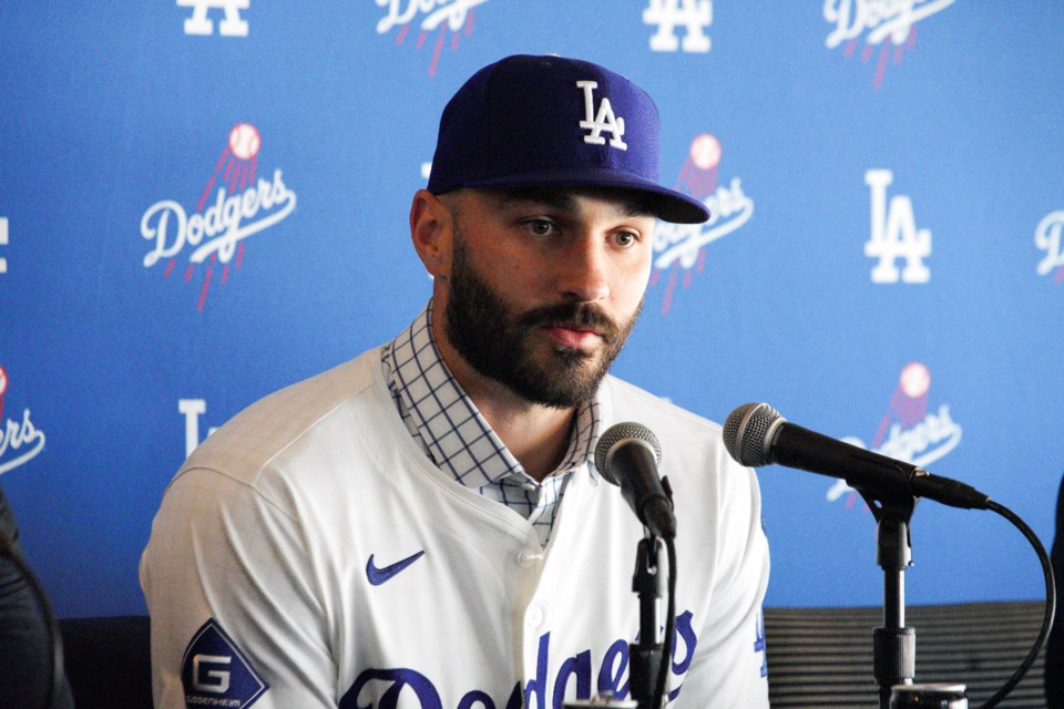 Left-handed reliever Tanner Scott answers questions during an introduction news conference at Dodger Stadium in Los Angeles on Thursday, Jan. 23, 2025. (AP Photo/Richard Vogel)