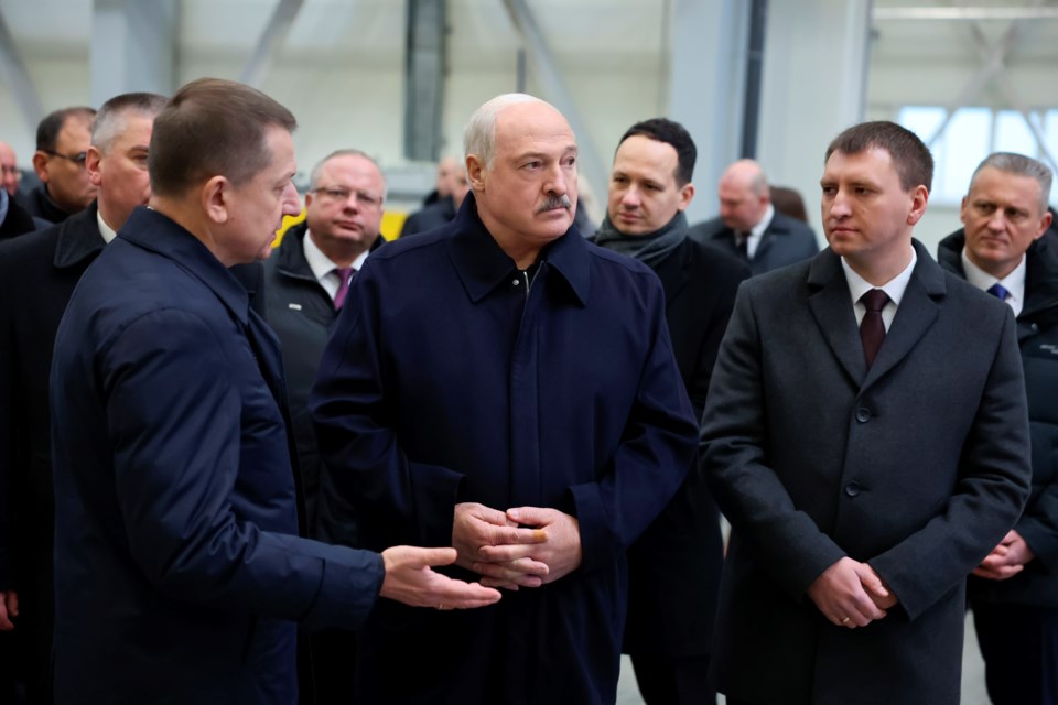 FILE - In this photo released by Belarus' Presidential Press Service, President Alexander Lukashenko, center, visits the Minsk Automobile Plant in Minsk, Belarus, Jan. 21, 2025. (Belarus' Presidential Press Service via AP, File)